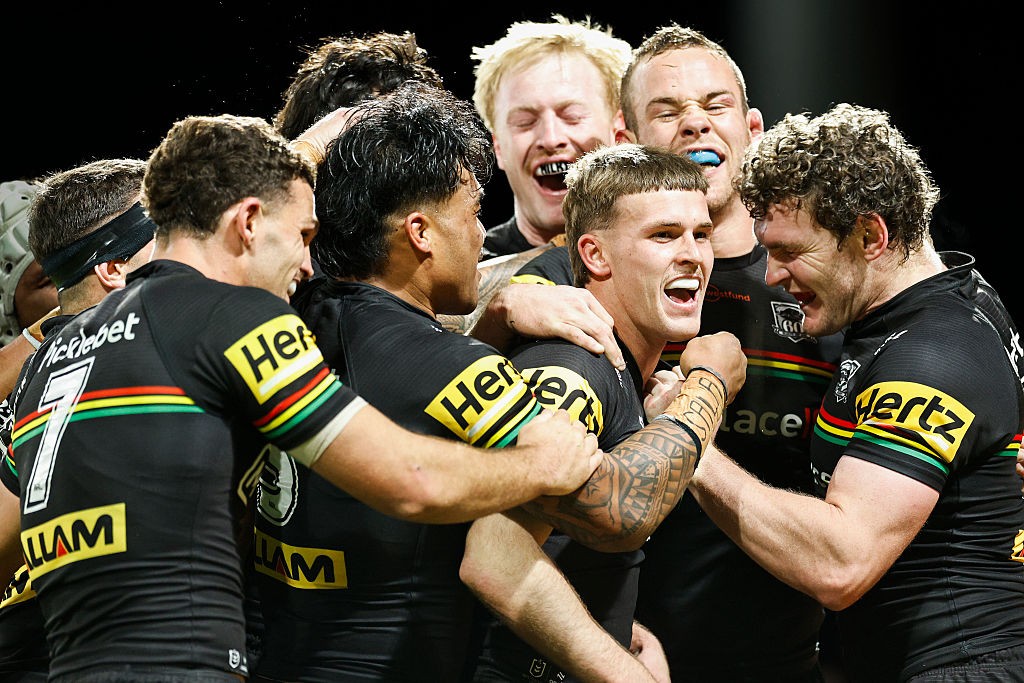 Penrith Panthers players regrouping during an NRL match